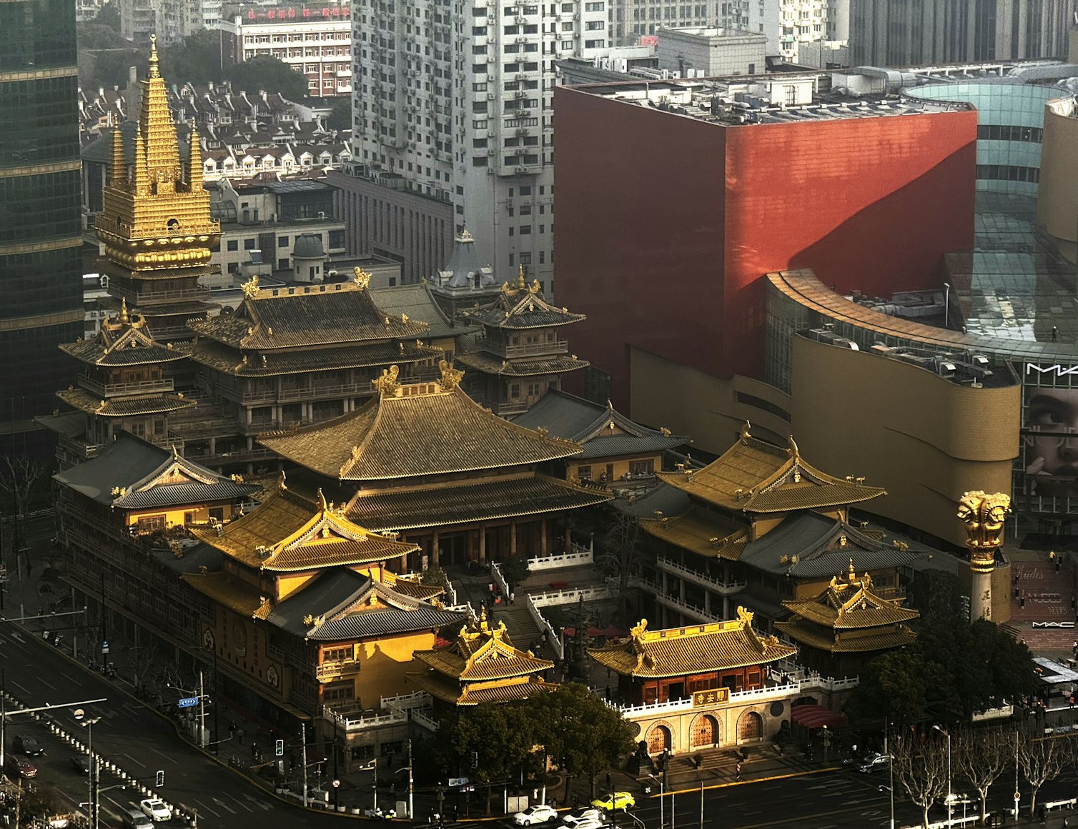 Jing'an Temple surrounded by modern skyscrapers